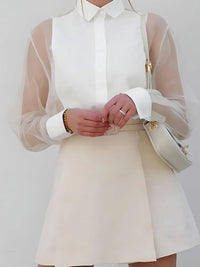 Dames Blouse met Transparante Mouwen – Elegant & Vrouwelijk – Évarisse