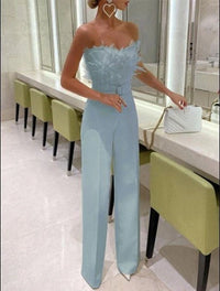 Feestelijke Jumpsuit met Verenaccent, Hoge Taille en Brede Pijpen – Opvallend & Elegant – Aliénor