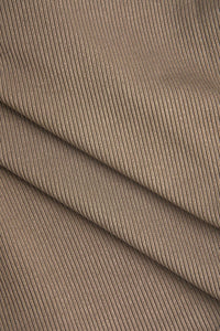 Bruine Asymmetrische Langarmtop met Cut-Out en Knoopdetails – Gedurfd & Vrouwelijk – Ambeline