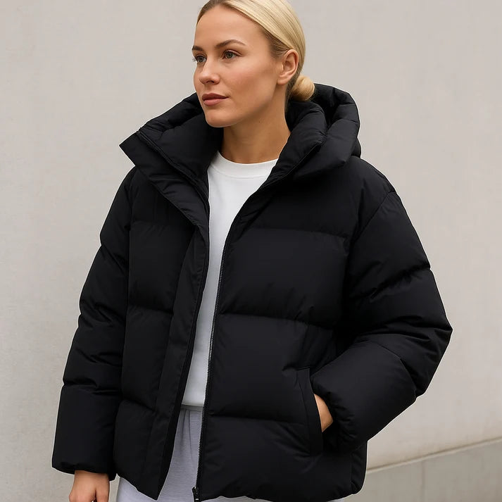 Boxy gewatteerde winterjas voor dames in zwart met capuchon en staande kraag