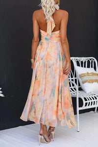 Mouwloze Maxi Jurk met Halterhals, Open Rug en Pastelprint – Zomers & Vrouwelijk – Liliane