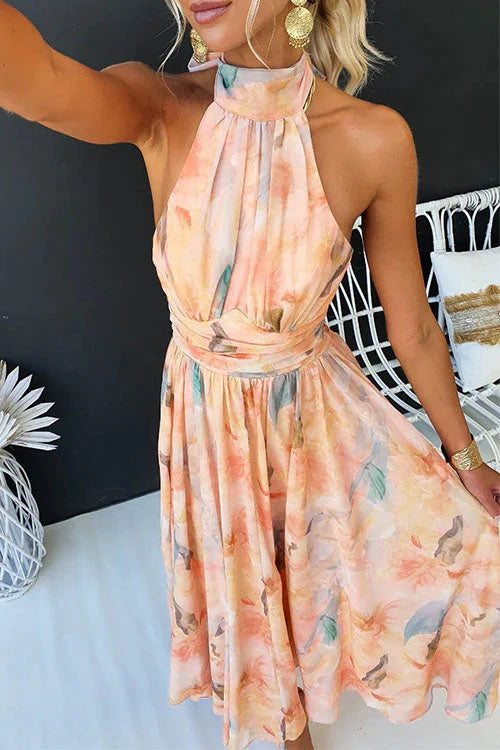 Mouwloze Maxi Jurk met Halterhals, Open Rug en Pastelprint – Zomers & Vrouwelijk – Liliane