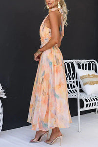 Mouwloze Maxi Jurk met Halterhals, Open Rug en Pastelprint – Zomers & Vrouwelijk – Liliane