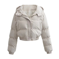 Beige dames puffer jas met stormflap en elastische mouwboorden