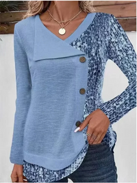 Blauwe dames blouse met asymmetrische overslagkraag en printmouwen