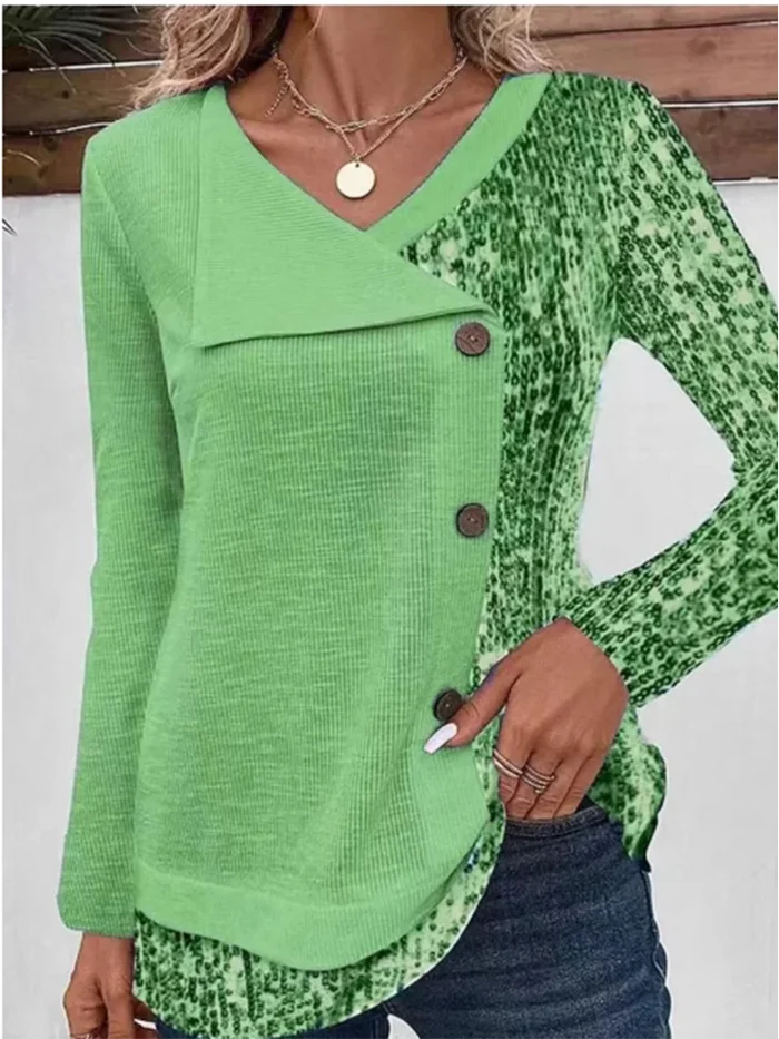 Groene blouse met effen voorpand en bedrukte mouwen