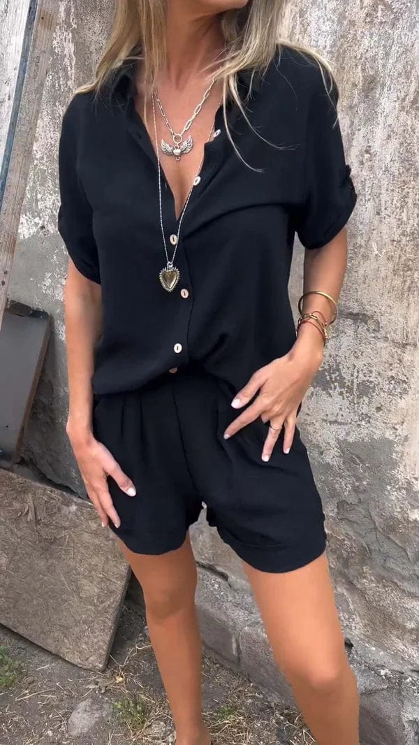 Zwarte set met blouse en shorts met knoopsluiting