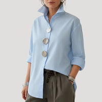 Blauwe blouse voor dames met ruime pasvorm en lange mouwen