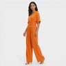 Jumpsuit met V-hals, Hoge Geplooide Taille en Wijde Pijpen – Elegant & Luchtig – Élodine