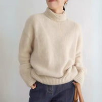 Beige fluffy dames coltrui met ruime mouwen en geribde boorden