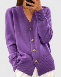 Paars dames vest met knoopsluiting en brede rib langs de zoom