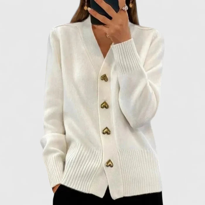 Wit gebreid vest met knoopsluiting, tot op de heup