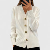 Wit gebreid vest met knoopsluiting, tot op de heup