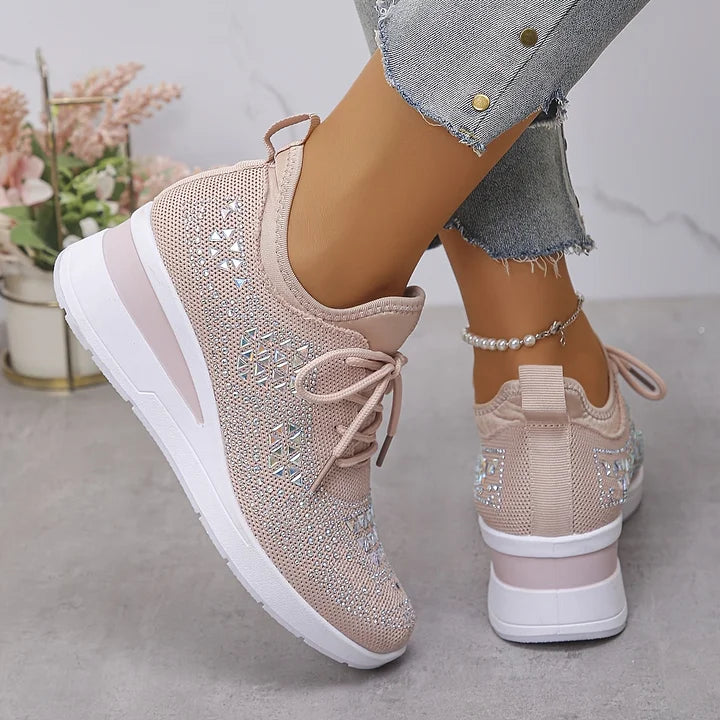 Lichtroze gebreide sneaker met ronde neus en vlakke zool