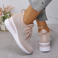 Lichtroze gebreide sneaker met ronde neus en vlakke zool
