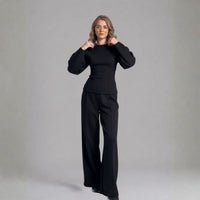 Getailleerde loungeset dames in zwart met wijde broek