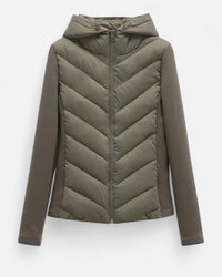 Legergroene gewatteerde dames puffer jas met capuchon en chevron stiksels