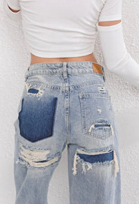 Vintage Ripped Jeans met Patchwork Detail – Edgy & Uniek – Indra