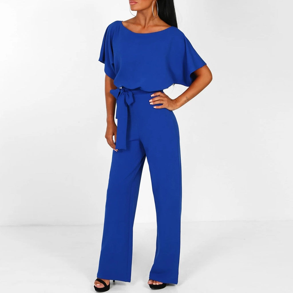 Wijde dames jumpsuit met vleermuismouwen en strikceintuur in blauw