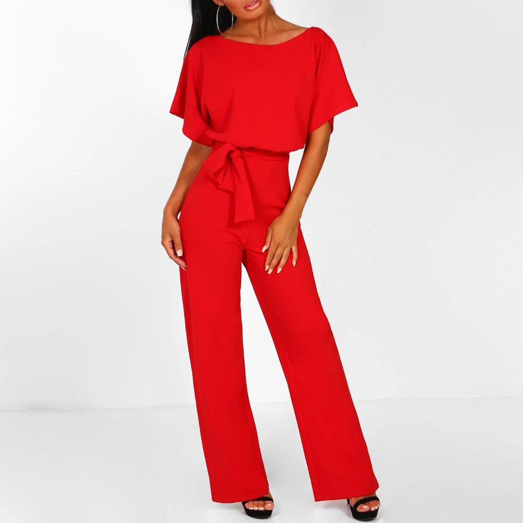 Wijde dames jumpsuit met vleermuismouwen en strikceintuur in rood