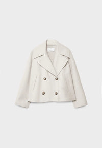 Korte beige damesjas met dubbele rij knopen en steekzakken