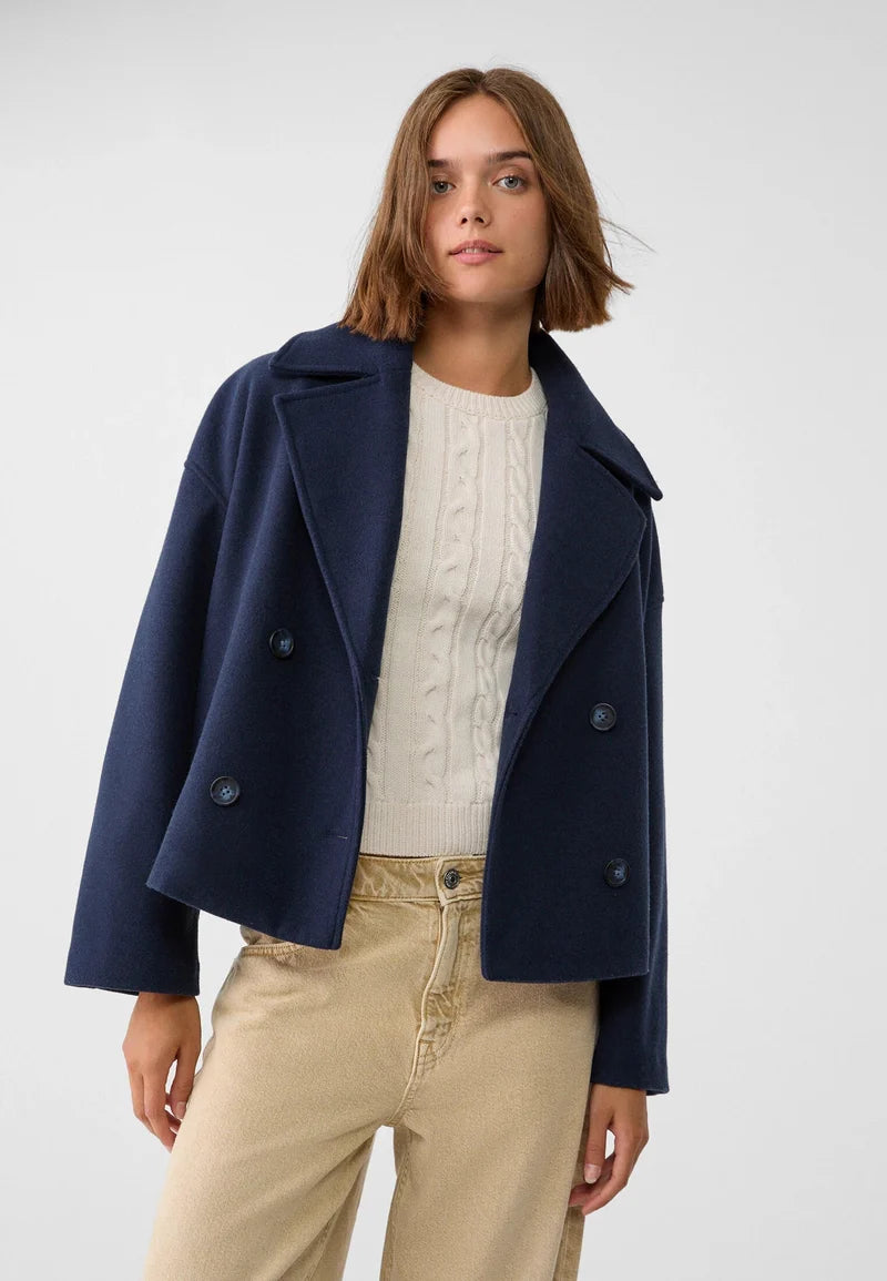 Marineblauwe korte dubbelrijs jas dames