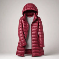 Bordeauxrode dames puffer jas tot over de heup