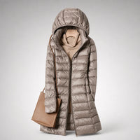 Khaki lange dames puffer jas met capuchon