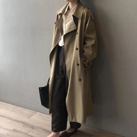 Khaki lange dames trenchcoat met dubbele knoopsluiting en reverskraag