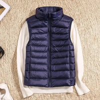 Lichtgewicht getailleerde dames bodywarmer in marineblauw