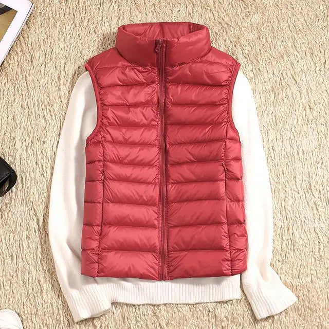 Lichtgewicht getailleerde dames bodywarmer in rood