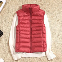 Lichtgewicht getailleerde dames bodywarmer in rood