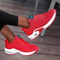 Rode dames sneakers met mesh bovenwerk en veters