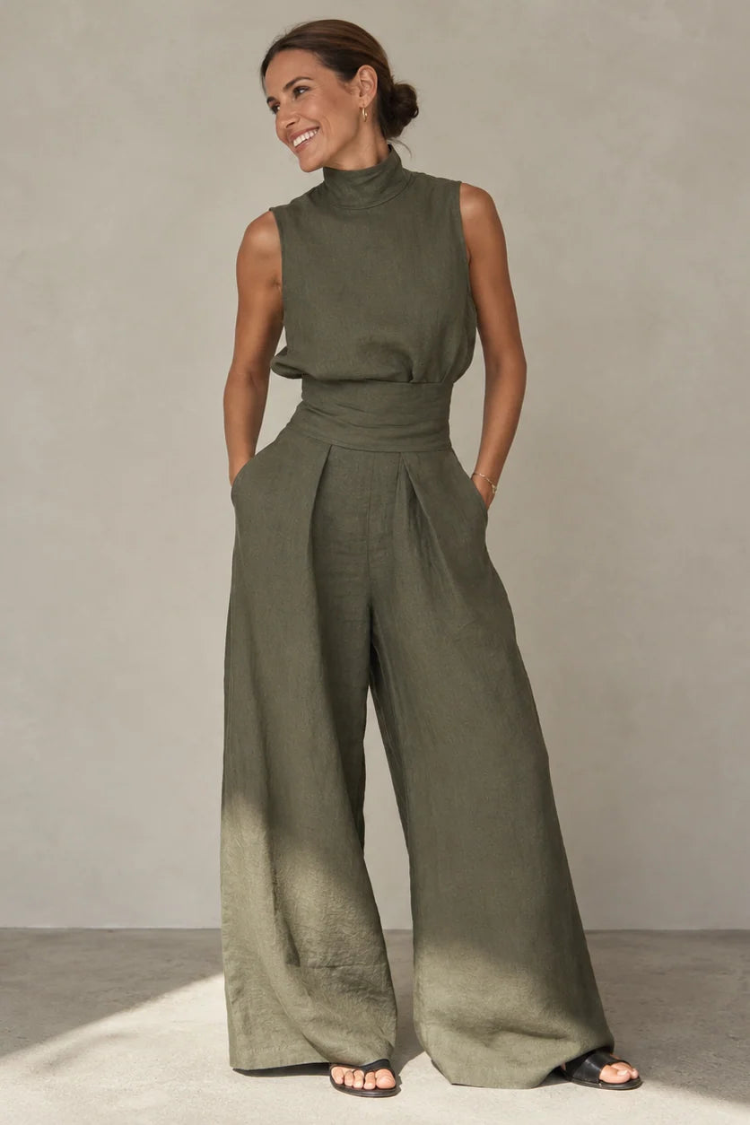 Groene mouwloze jumpsuit dames met opstaande kraag en wijde pijpen