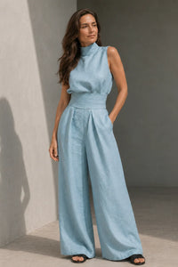 Lichtblauwe wide leg jumpsuit dames met gesloten hals