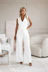 Mouwloze Jumpsuit met Reverskraag, Strikband en Wijde Pijpen – Chic & Getailleerd – Octavienne
