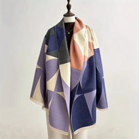 Omkeerbare ponchosjaal voor dames in lila met grafisch patroon