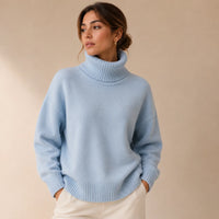 Lichtblauwe oversized dames coltrui met brede geribde col