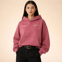 Oversized dames hoodie met buidelzak en capuchon in roze