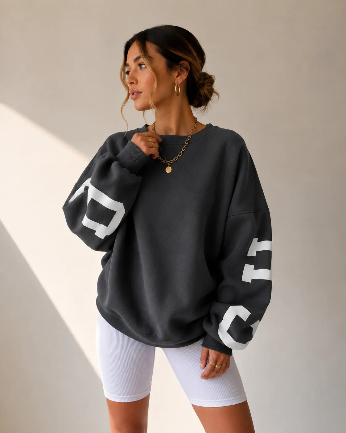 Antracietgrijze oversized dames sweater met ronde hals en geribde boorden