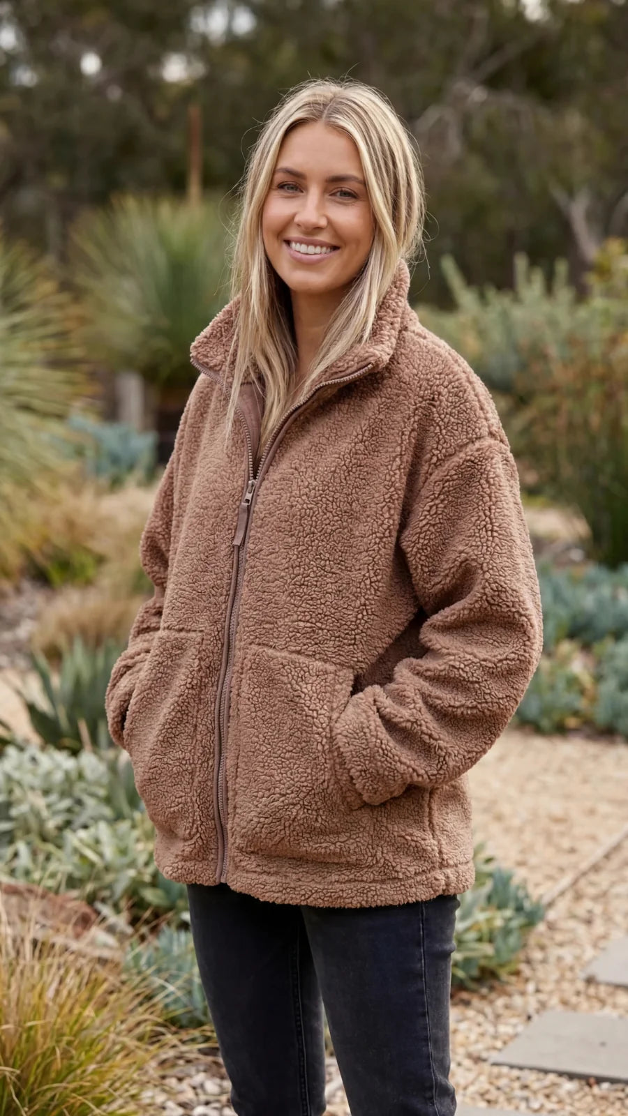 Bruine oversized dames teddy jas met rits en zakken op heuphoogte