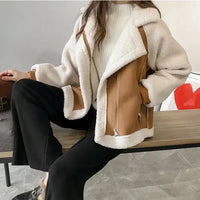Oversized dames teddy jas in bruin met suèdelook panelen