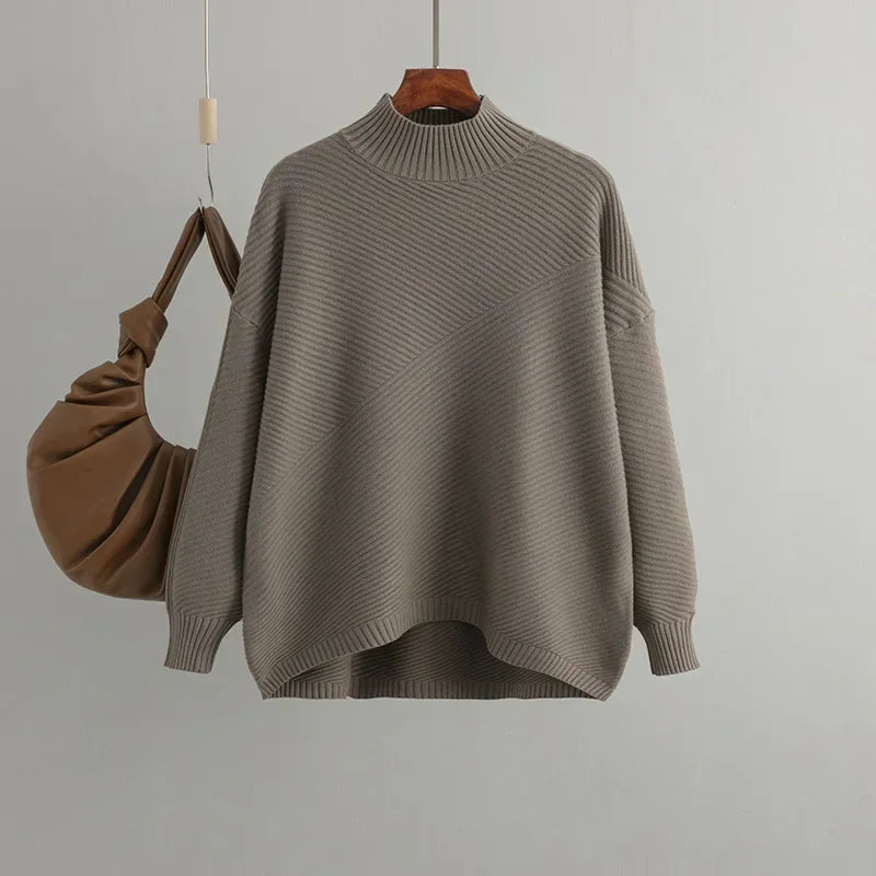 Taupe oversized dames trui met halve col en diagonale rib
