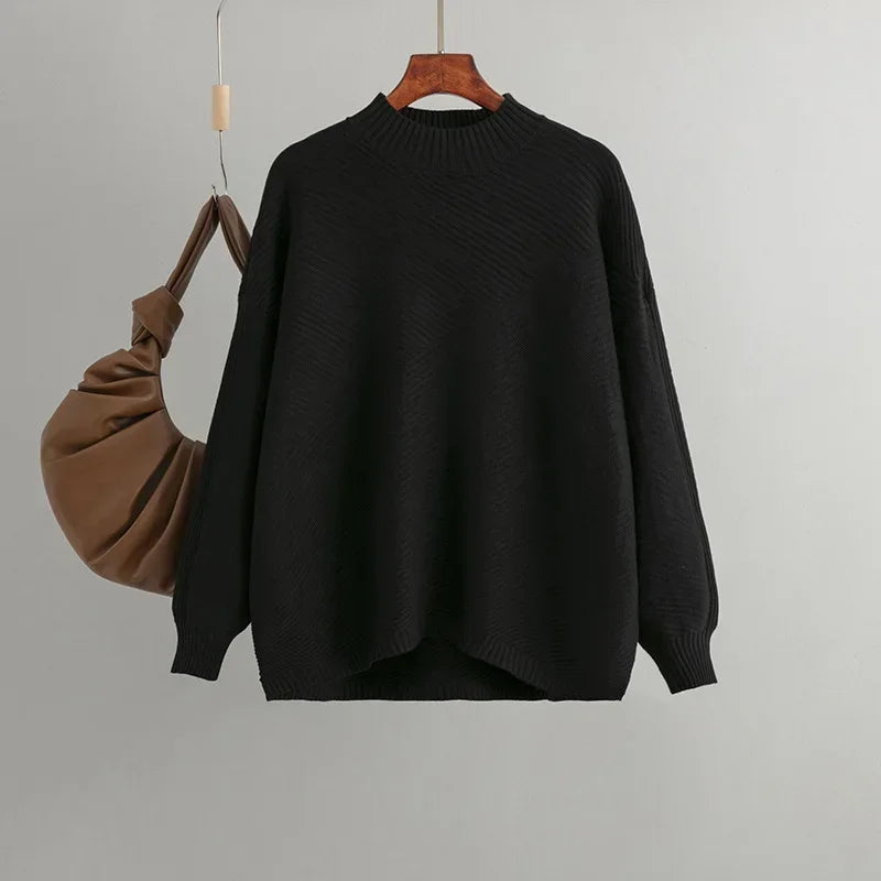 Zwarte oversized dames trui met halve col en diagonale rib