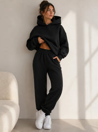 Zwart oversized joggingpak dames met capuchon en sweatpants