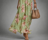 Maxi Jurk met Halternek, Bloemenprint en Goudkleurig Detail – Zomers & Elegant – Suus