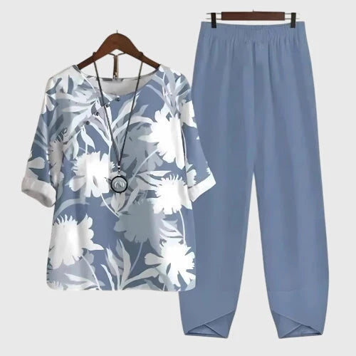 Blauwe tweedelige set dames met halflange mouwen