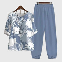 Blauwe tweedelige set dames met halflange mouwen