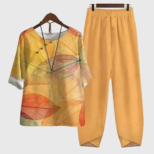 Oranje set met top en broek met overslag aan de zoom