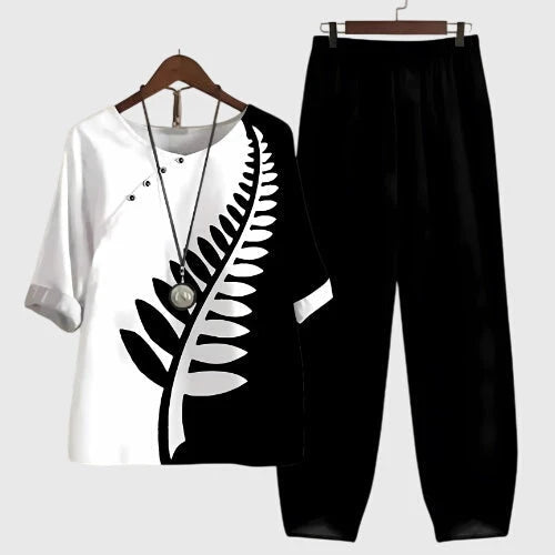 Zwarte broek met witte bedrukte top als tweedelige set